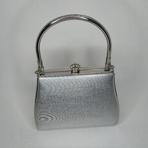 Silver Toned Elegant Handbag Purse Clutch With Metal Handle And Top Closure